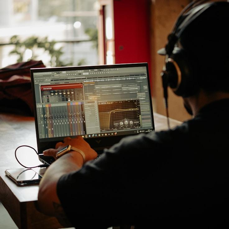 Mobile app project planning workspace with devices and development tools